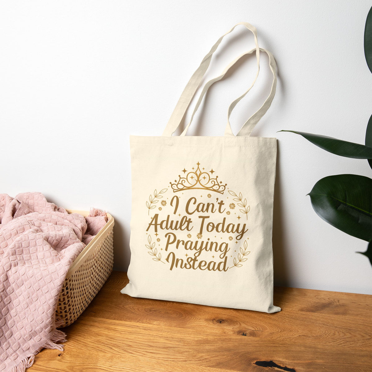 Prayer-themed cotton tote bag with crown and floral artwork

